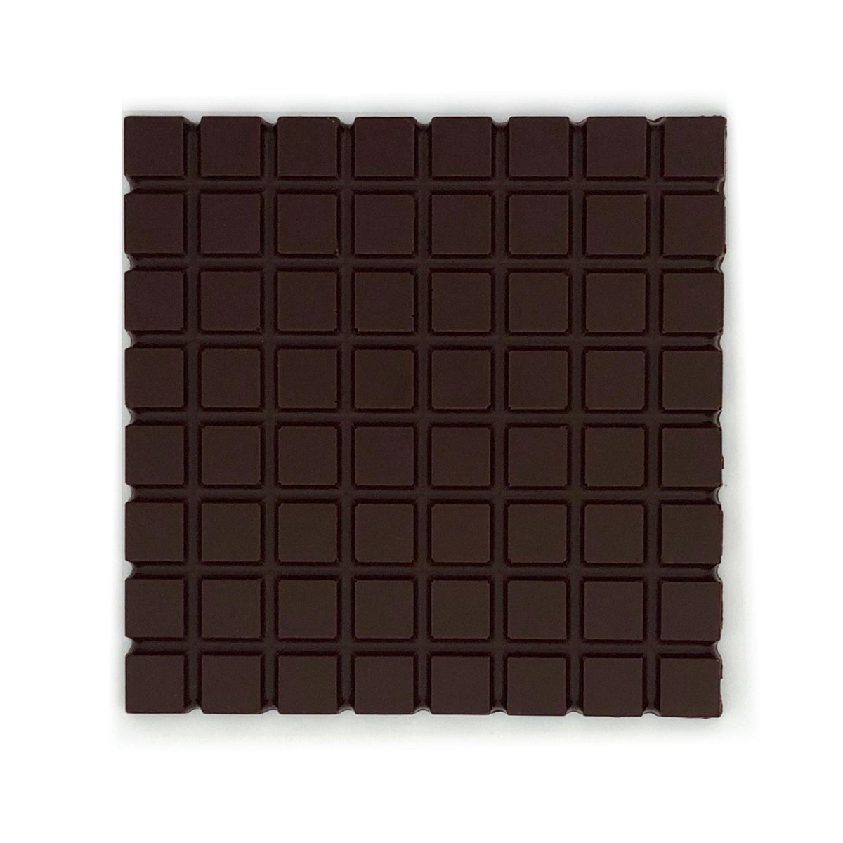 Extra dark chocolate bar made from 85% cocoa, featuring a textured grid pattern, organic and sourced from Dominican Republic.
