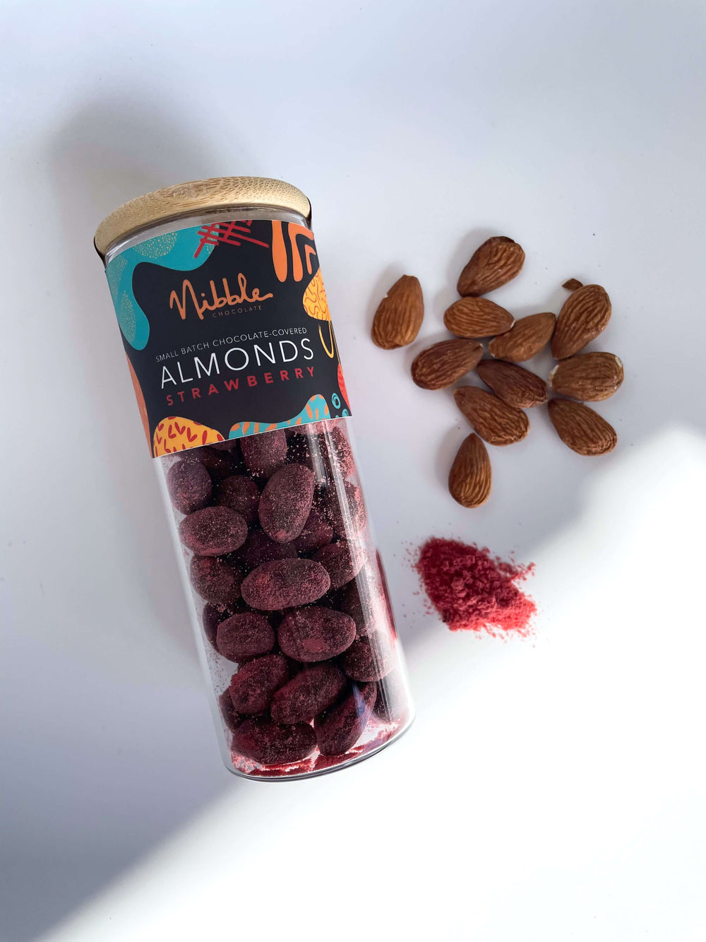 Nibble strawberry chocolate-covered almonds